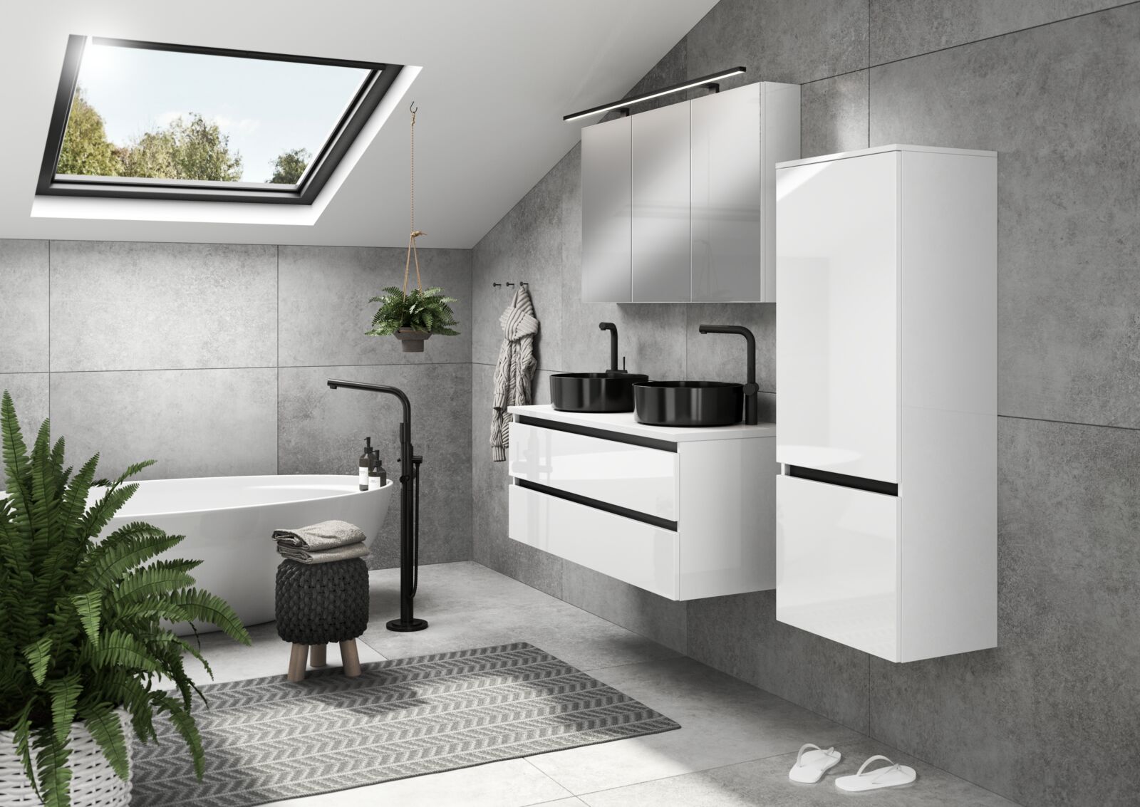 Badkamer met strak moderne look, grijze muur, witte meubels, wit vrijstaand bad, zwarte waskommen en zwarte kranen.